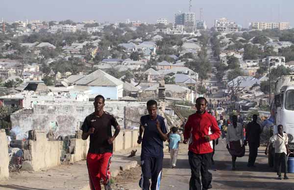 Training in a bullet-riddled stadium where the remains of a rocket propelled grenade lies discarded on the track's edge counts as progress for Somali Olympic hopeful Mohamed Hassan Mohamed. In former rebel camp, Somali athletes eye London