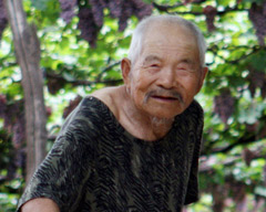 Villagers call on Japan to atone for massacre