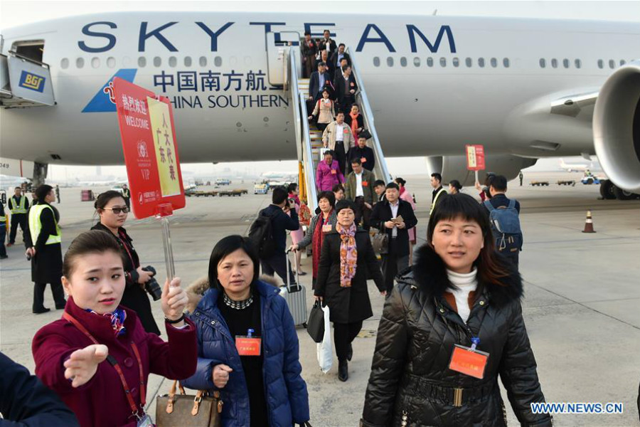 Deputies to 12th NPC arrive in Beijing