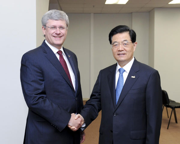 China and Canada signed foreign investment promotion and protection accord on Sunday as President Hu Jintao met with Prime Minister Stephen Harper on the final day of the Asia-Pacific Economic Cooperation summit. China, Canada sign investment promotion accord