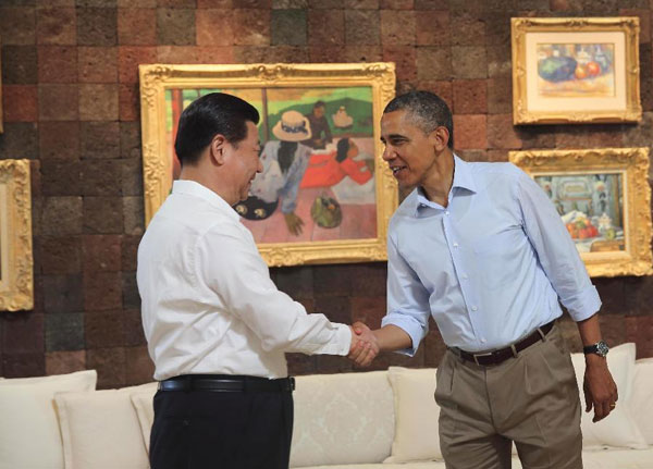 Obama and Xi start talk with a walk