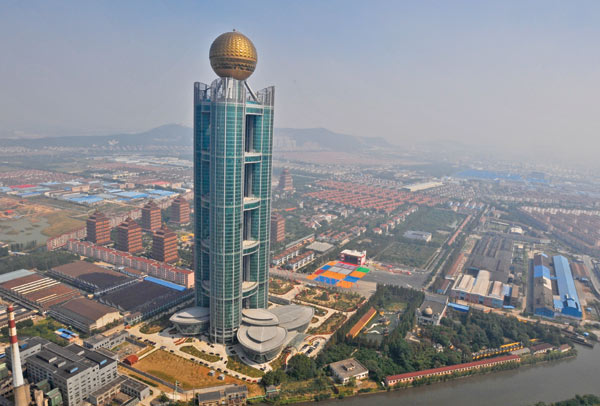 Huaxi village is turning to new pastures for profit as the old avenues lose their sheen.  Hard work nets Huaxi a towering success