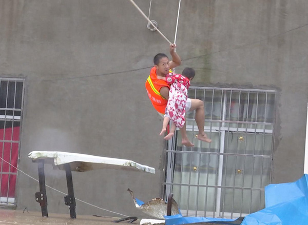 Hubei residents, facing floods, race against time