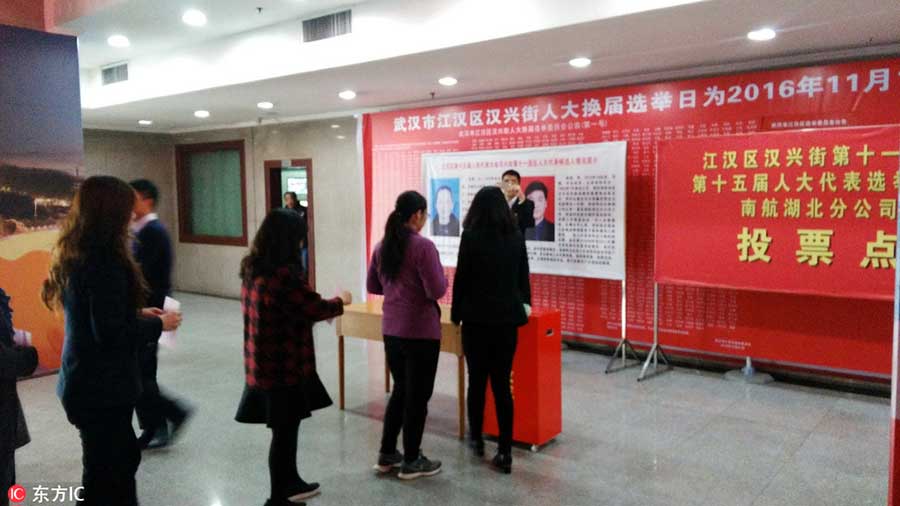 Xi casts vote for new lawmakers
