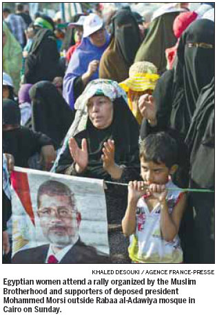 Morsi backers march as envoys seek solution