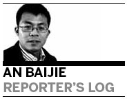 Villagers pay high cost for life beside contaminated riverbank