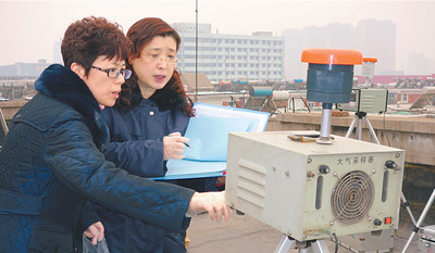 新春走基層 PM2.5監(jiān)測 三分法得出空氣質量報告