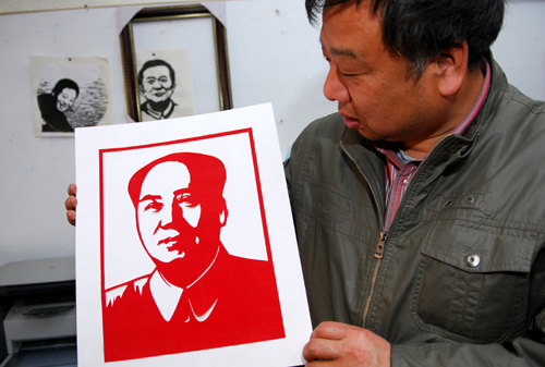 河南民間藝人創(chuàng)作四代領(lǐng)導(dǎo)人肖像喜迎上海世博會