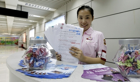 22歲站務(wù)員僅逛一次世博園制出10多份世博攻略