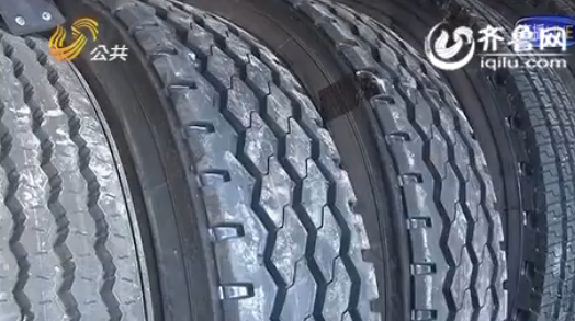 實(shí)拍德州黑作坊里翻新輪胎：舊胎打磨粘新胎面出售