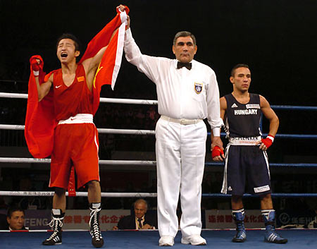 Zou wins China's first world boxing title