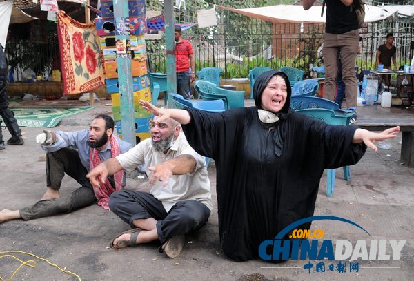 埃及對穆爾西支持者清場 穆兄會稱數(shù)百人亡(組圖)
