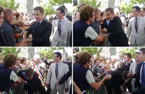 薩科齊“親民秀”遭人拉扯險(xiǎn)摔倒 連任之路堪憂