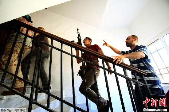 卡扎菲下落未明 妻子與兒女現(xiàn)身阿爾及利亞