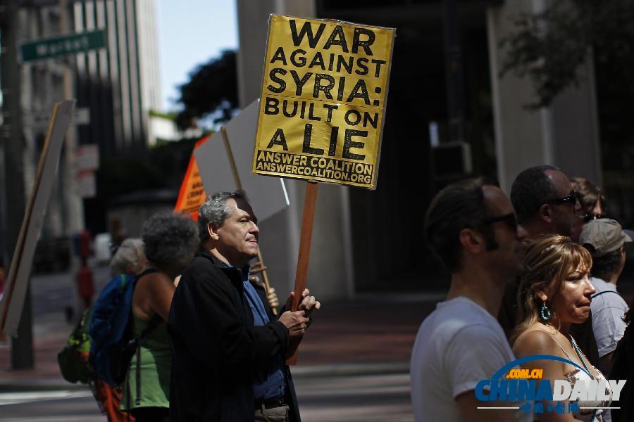 美國多地反戰(zhàn)游行 要求國會否決軍事打擊敘利亞提案