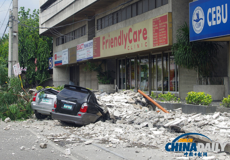 菲律賓災(zāi)區(qū)眾生相 在災(zāi)難中仍堅守希望