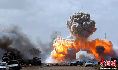 全球媒體質(zhì)疑多國(guó)聯(lián)軍 濫用武力空襲利比亞