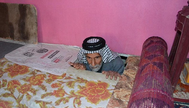 薩達(dá)姆時(shí)期政治犯悲慘生活曝光 曾藏身地窖20余年