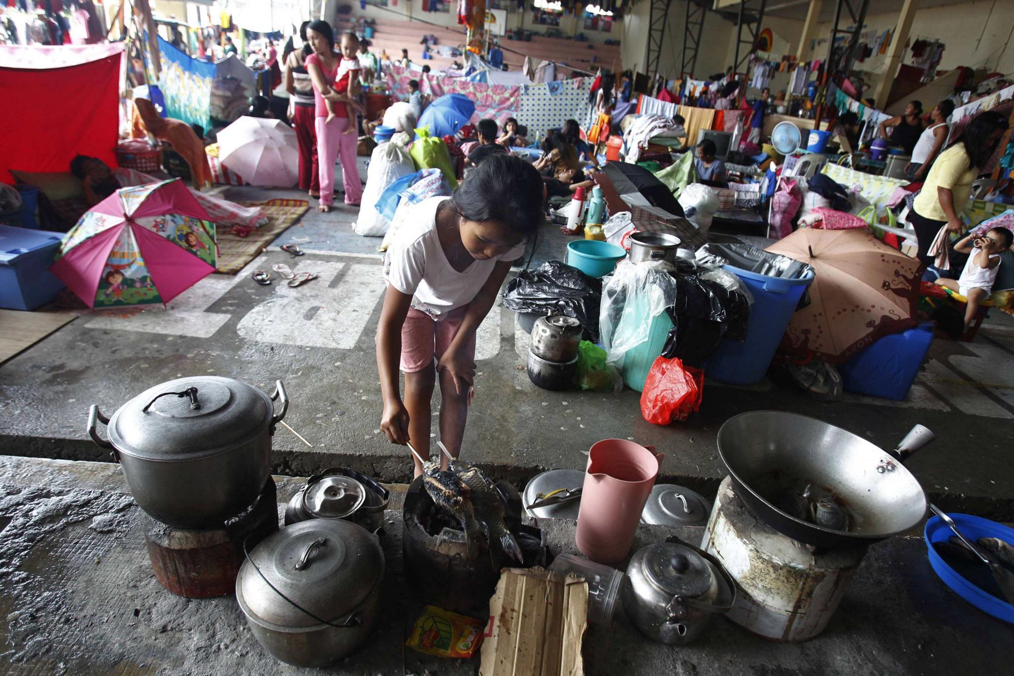 “?？?#8221;致菲律賓首都暴雨肆虐 逾六成城區(qū)被淹百萬余人受災(zāi)
