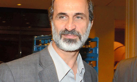 敘反對(duì)派領(lǐng)導(dǎo)人宣布辭職 美敦促伊拉克勿助伊朗軍援?dāng)⒗麃? width=