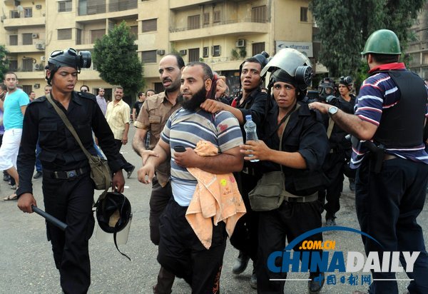 埃及對穆爾西支持者清場 穆兄會稱數(shù)百人亡(組圖)