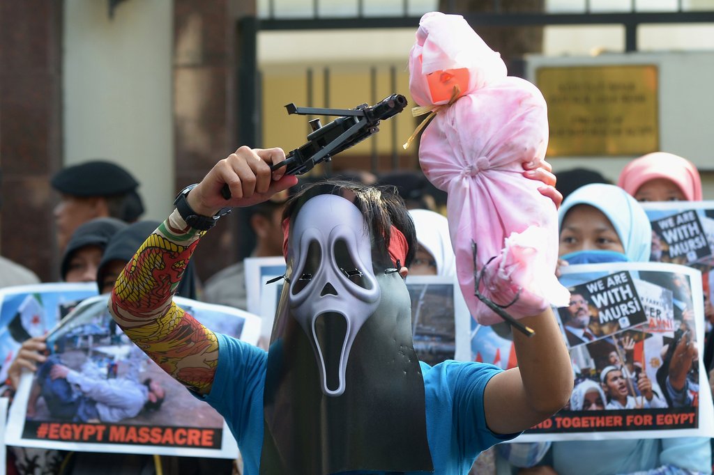 印尼數(shù)千穆斯林集會聲援埃及民眾 痛批奧巴馬（圖）