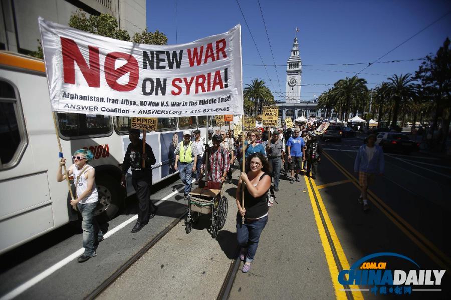 美國多地反戰(zhàn)游行 要求國會(huì)否決軍事打擊敘利亞提案