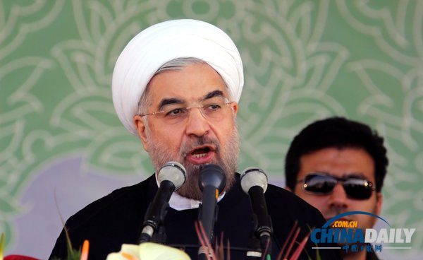 魯哈尼出席伊朗年度閱兵式 稱希望敘利亞結束內戰(zhàn)