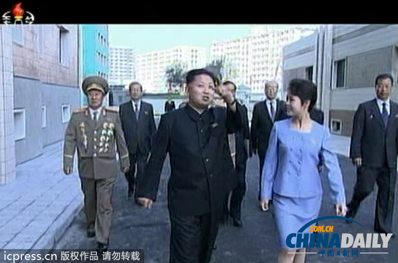 朝鮮勞動(dòng)黨成立68周年 金正恩攜夫人看演出興趣濃(圖)