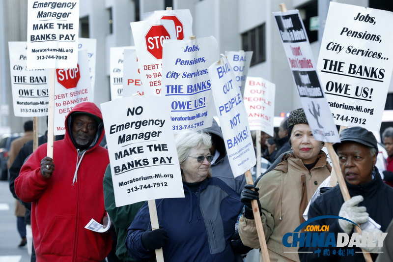 底特律破產(chǎn)案至今無解 市民游行抗議政府賴賬（圖）