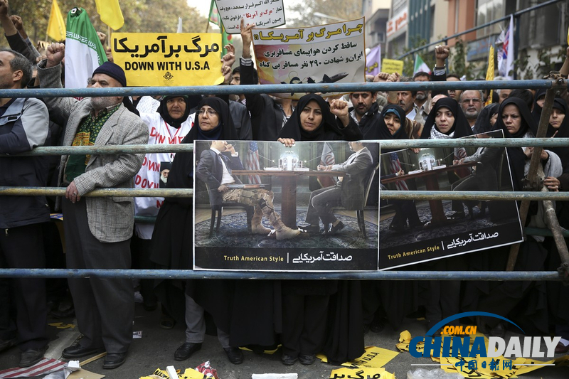 伊朗民眾焚燒美國(guó)旗 紀(jì)念占領(lǐng)美使館事件34周年(組圖)