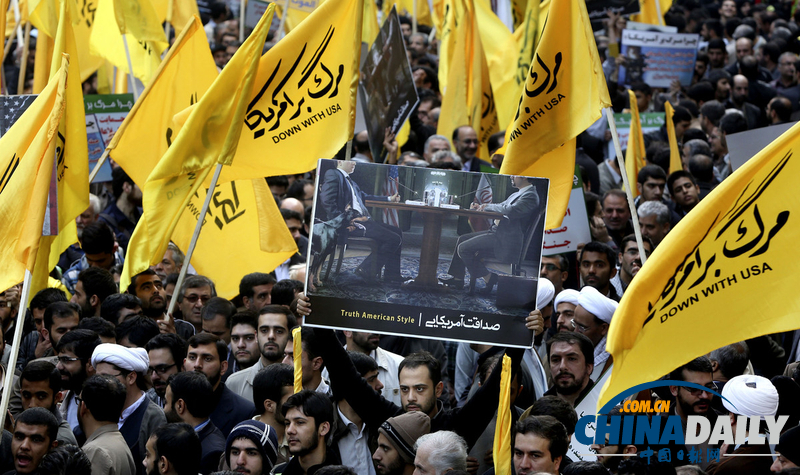 伊朗民眾焚燒美國(guó)旗 紀(jì)念占領(lǐng)美使館事件34周年（組圖）