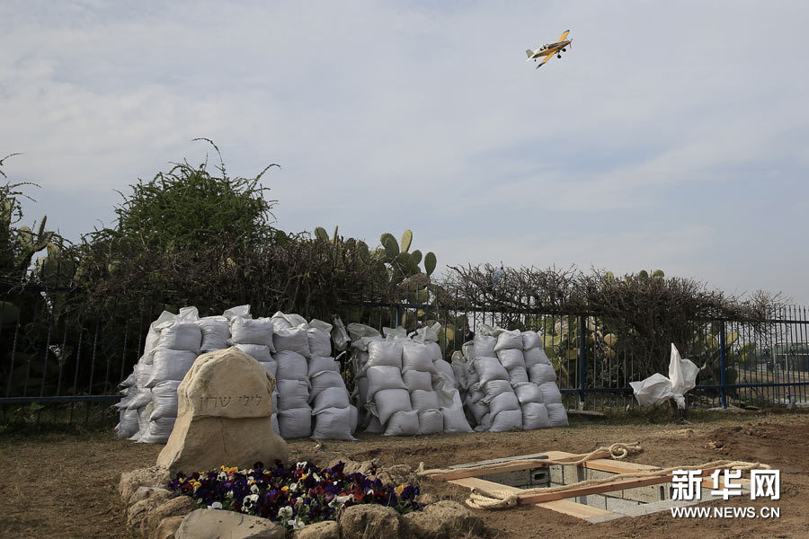 以色列前總理沙龍安葬地準(zhǔn)備就緒 家族農(nóng)場(chǎng)降半旗