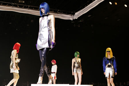 Models diaplay hairstyles during 