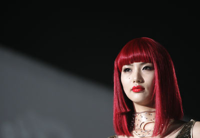 Models diaplay hairstyles during 