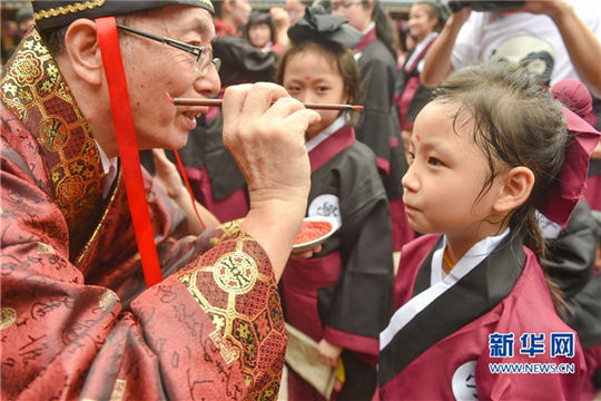 Students 'worship teachers' as new semester begins