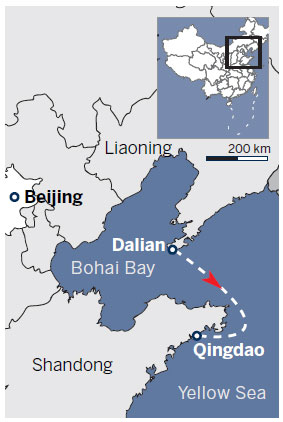 Carrier docks at Qingdao