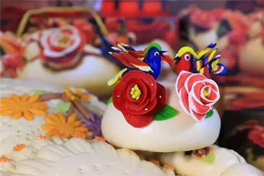 <EM>'Jiaodong hua bobo'</EM>: flouring of tradition and artistry