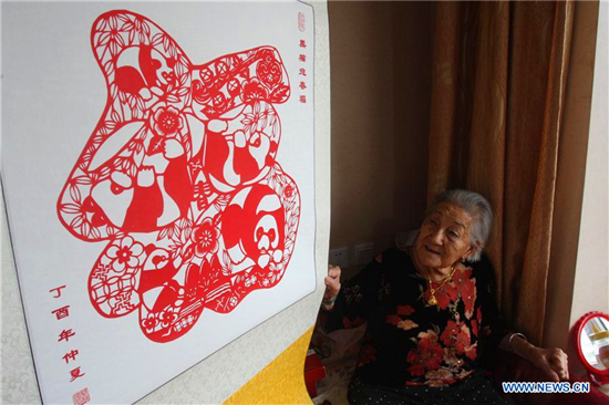 In pics: papercuttings made by 103-year-old woman