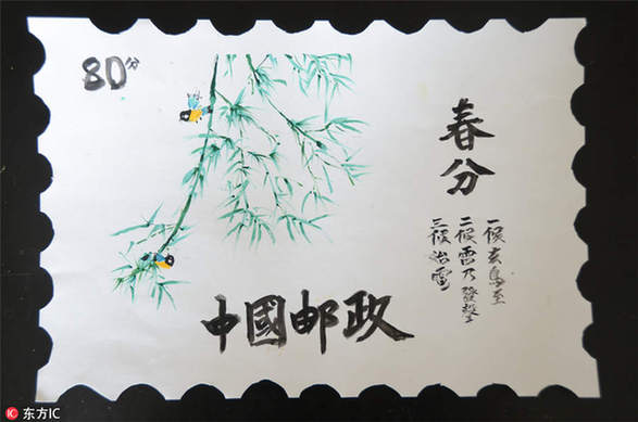 Student paints spring scenes on stamps