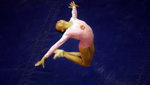 China's Pang Panpan performs during the women's beam final of the Shanghai FIG World Cup gymnastics competition in Shanghai July 16, 2006.