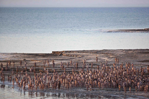 Naked volunteers pose for American photographer Spencer Tunick on the shore of the Dead Sea in Israel, which is the lowest point on earth, September 17, 2011. Tunick in Israel for naked Dead Sea photo