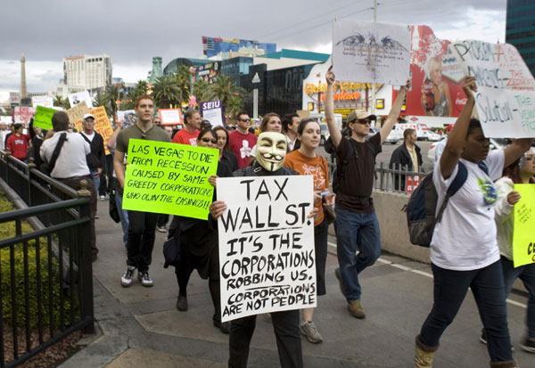 Protesters march on the Las Vegas Strip during an 'Occupy Las Vegas' demonstration in Las Vegas, Nevada October 6, 2011. US 'occupied' by protestors