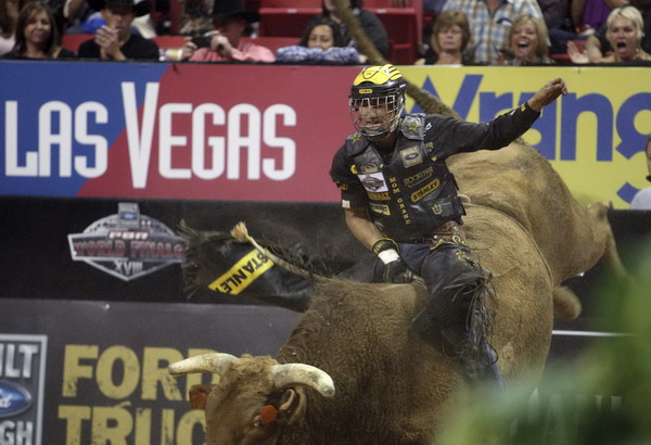 Brazilian bull rider Silvano Alves rides his final bull during the Professional Bull Riders World Finals in Las Vegas, Nevada Oct 30, 2011. Brizilian bull rider wins PBR world finals