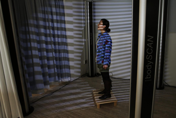 Mariya Kawae, 30, receives a full-body scan during a workshop ahead of Valentine's Day at KS Design Lab in Tokyo February 2, 2013. Personalized gifts for your Valentine