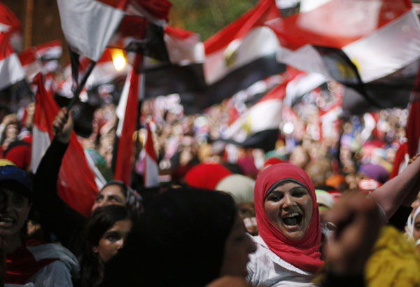 Protesters against Egyptian President Mohamed Mursi react in Tahrir Square in Cairo July 3, 2013. Jubilant crowds celebrate after Morsi overthrown