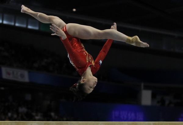 China wins 2 more golds at gymnastics worlds