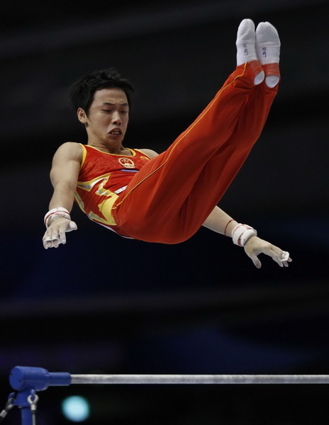 China wins 2 more golds at gymnastics worlds
