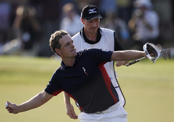 Luke Donald was on top of the world in more ways than one on Sunday after becoming the first player to win the money-list crowns in Europe and the United States. Donald achieves remarkable order of merit double