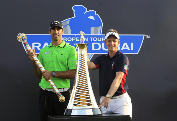 Luke Donald was on top of the world in more ways than one on Sunday after becoming the first player to win the money-list crowns in Europe and the United States. Donald achieves remarkable order of merit double